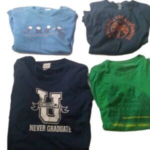 Set of 4 T-shirts. X Large T-shirts from various marathons. Worn once. Excellent